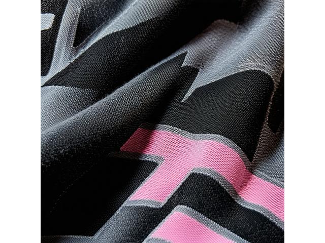 Close-up editorial image showing fabric details and textures from Fall 2022 collection