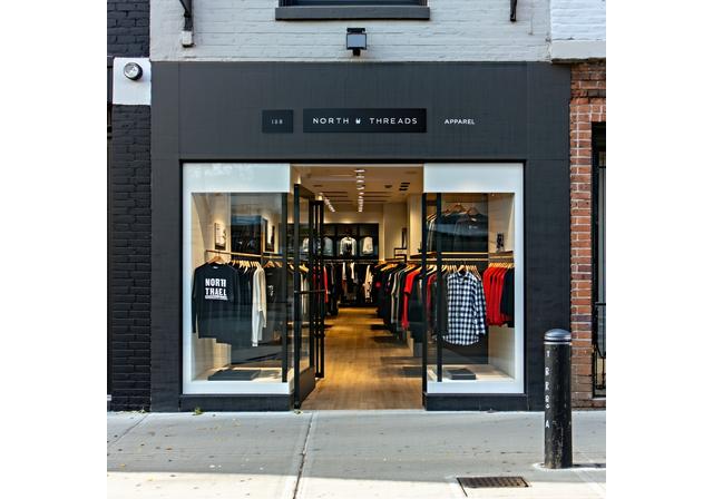 Exterior of North Threads streetwear store with urban design